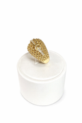 Women's ring in 10K gold with a textured dome design and sparkling details.