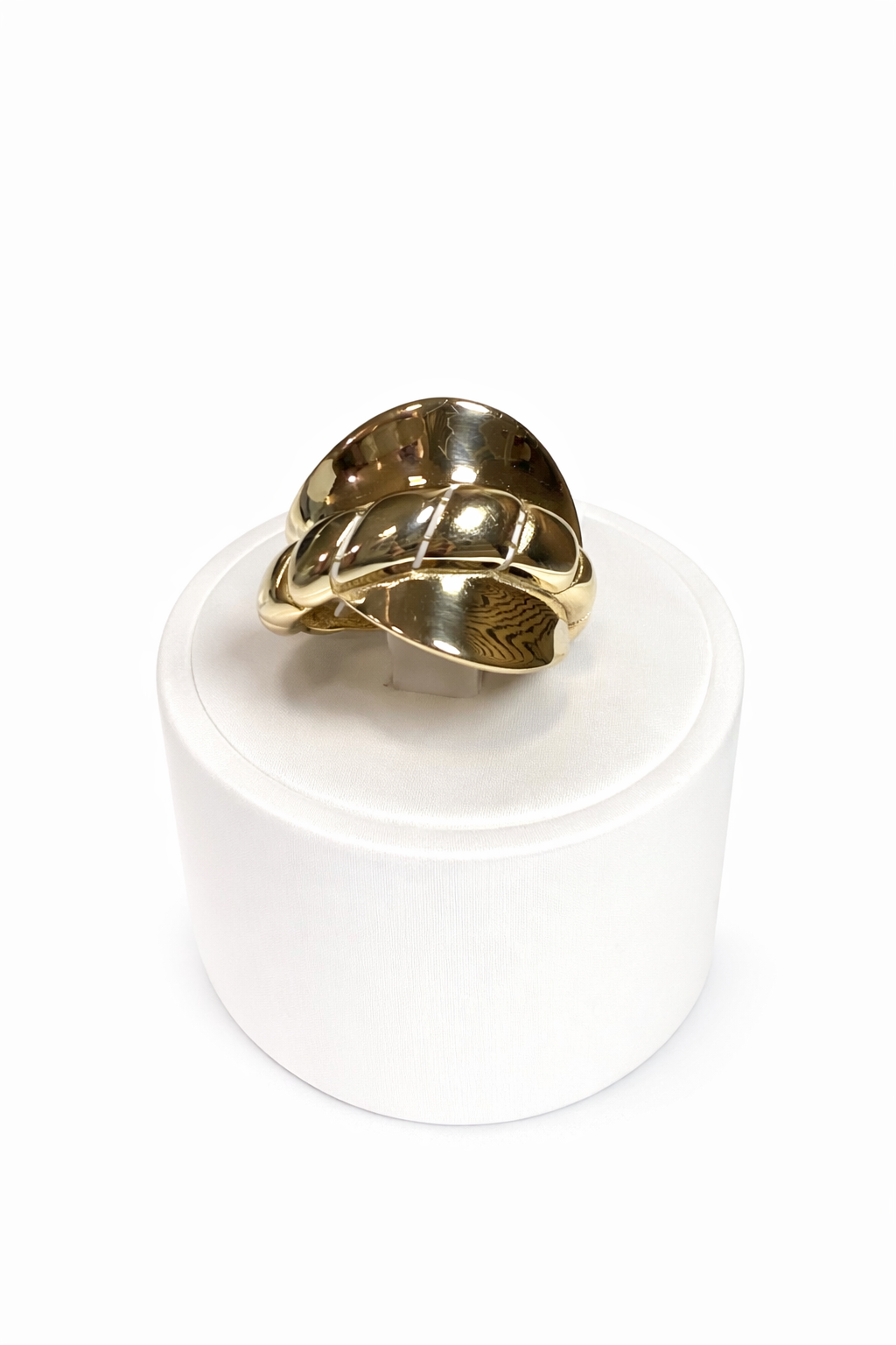 10K gold ring with an interlocking knot design and a mirror finish.