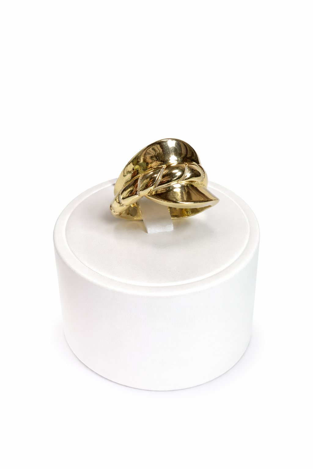 10K gold ring with an interlocking knot design and a mirror finish.