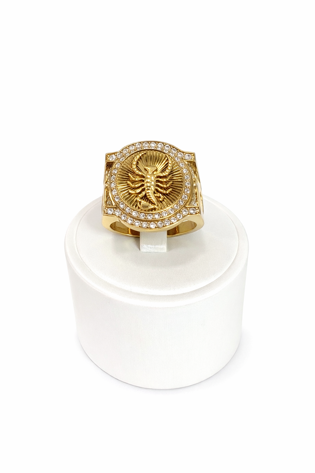 Men's ring in 10K gold with a raised scorpion design and a sparkling halo.